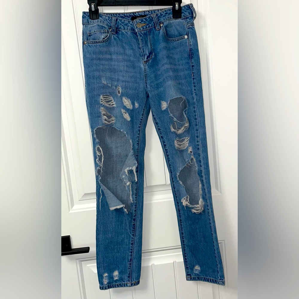 Forever 21 ripped blue jeans.